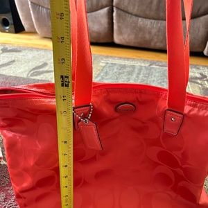 Coach bag with detachable smaller bag